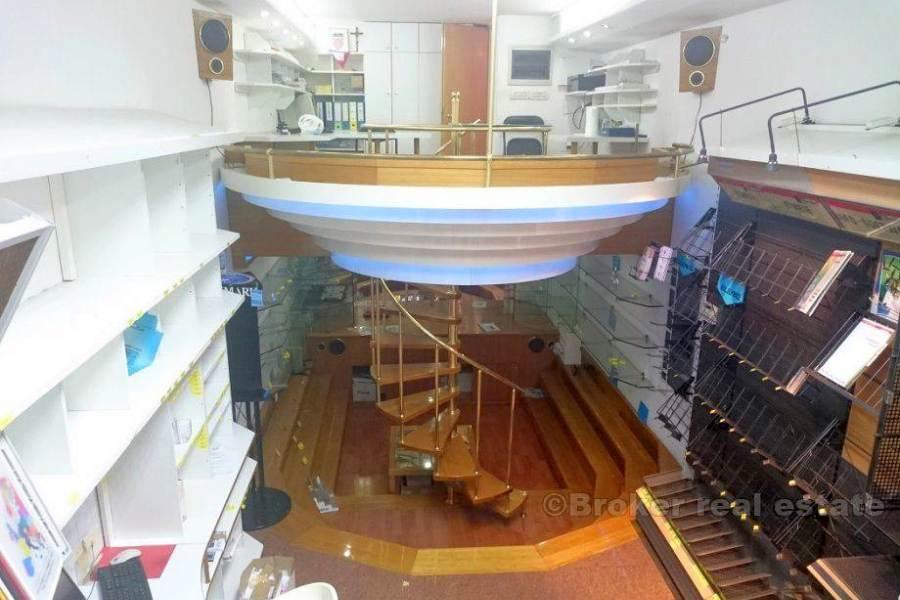 An interesting commercial space with a gallery, for rent