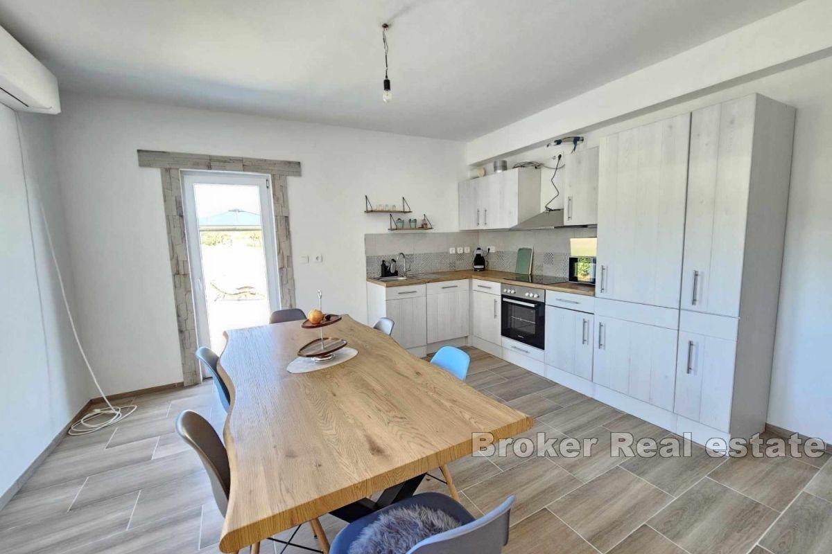 Ground floor house with a spacious plot