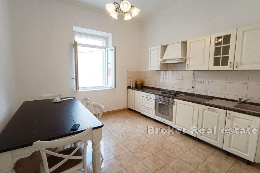 Spacious apartment with a yard
