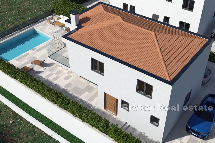 Luxury villa under construction with pool and sea view