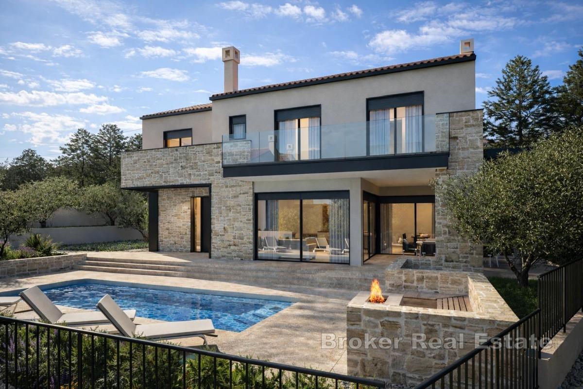Villa moderna con piscina riscaldata e vista mare