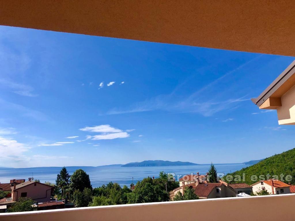 Ferienhaus mit Pool und Meerblick