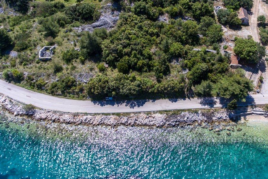 Terrain constructible au premier rang de la mer