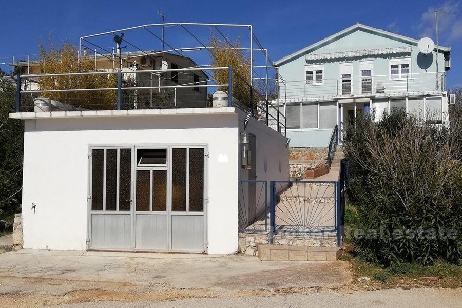 Seafront hus med båt kaj, til salgs