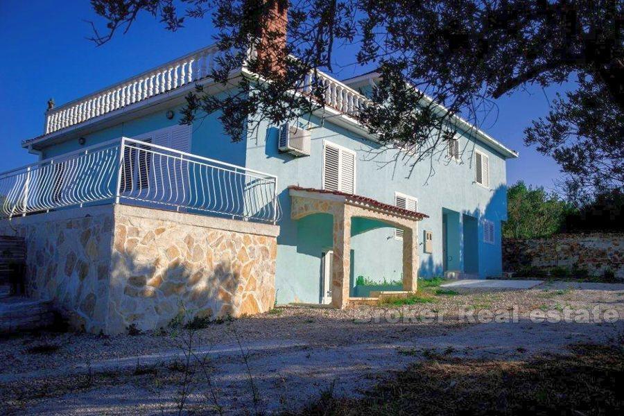 House in the second row from the sea