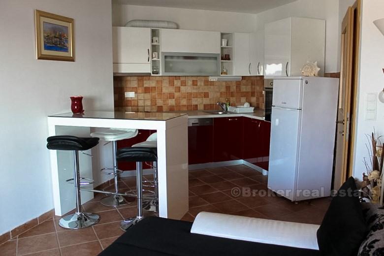 Apartment near Split, in a new building, seafront, on sale