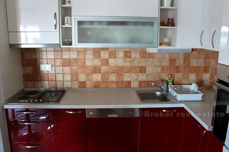 Apartment near Split, in a new building, seafront, on sale