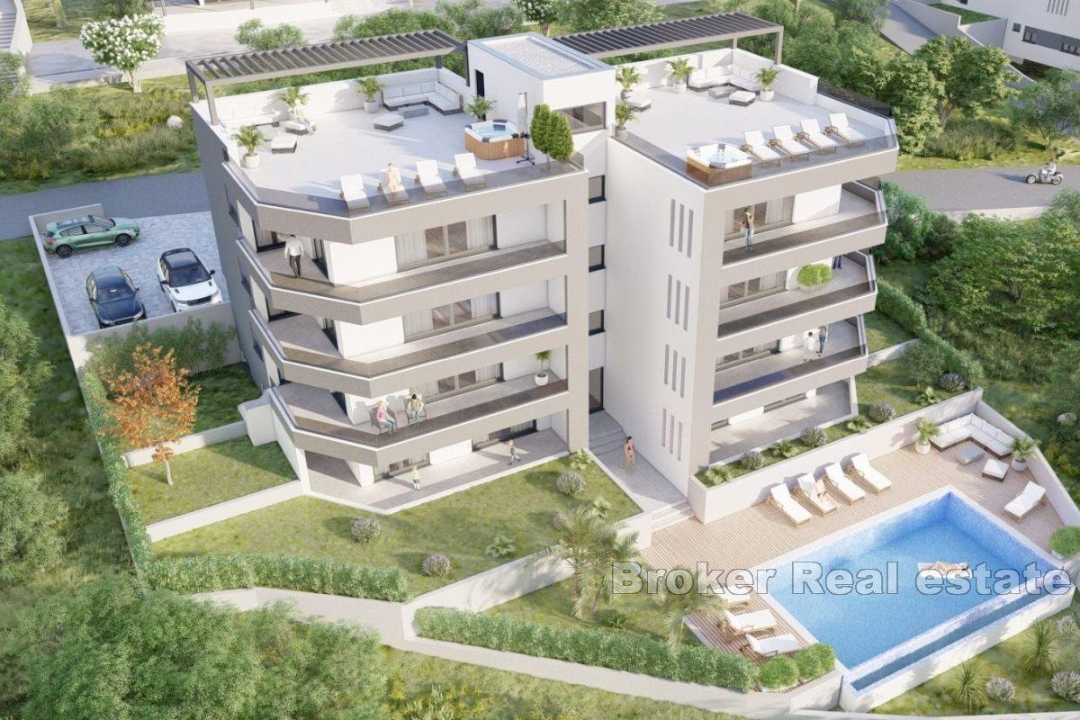 Apartments under construction with swimming pool and open view