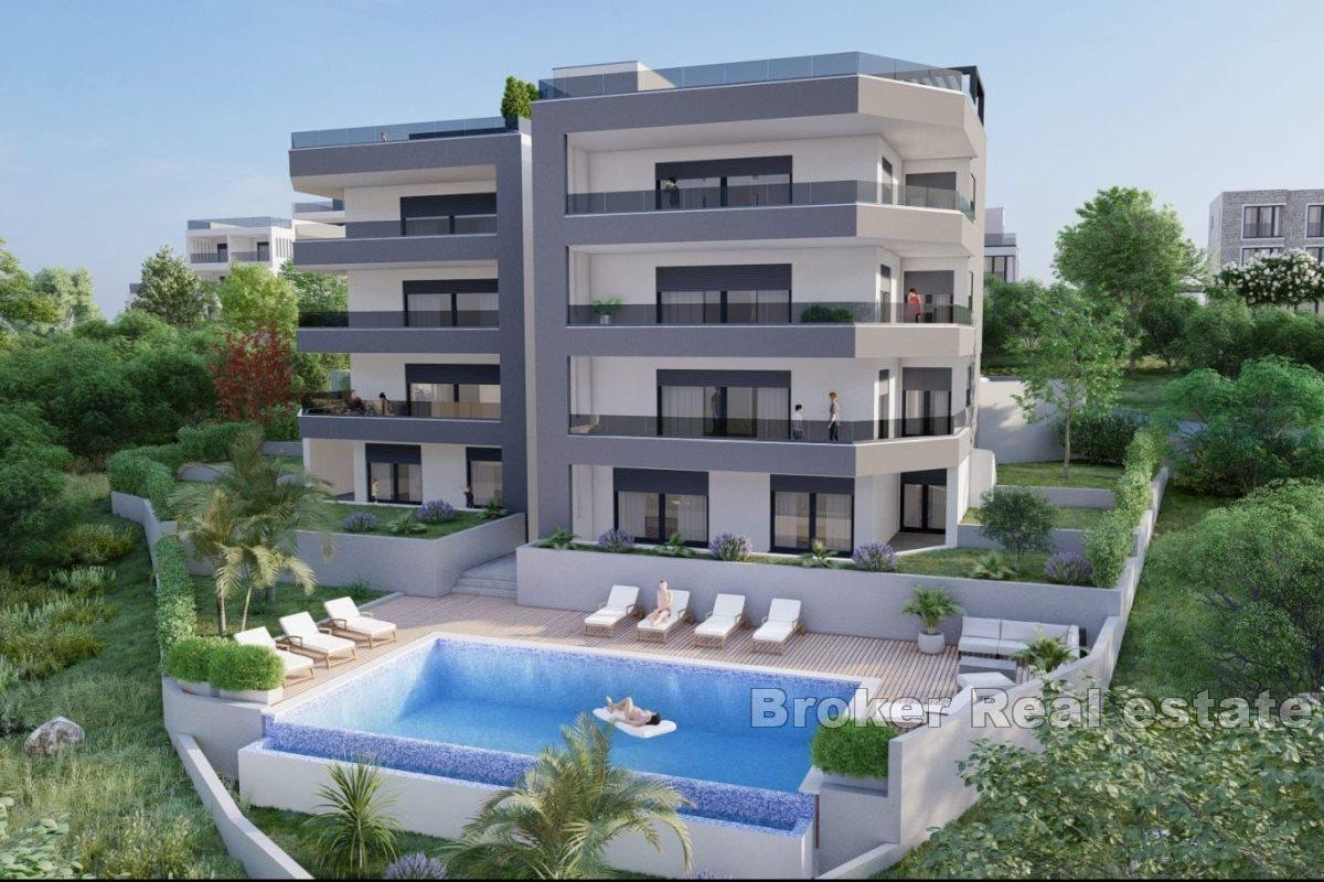 Apartments under construction with swimming pool and open view