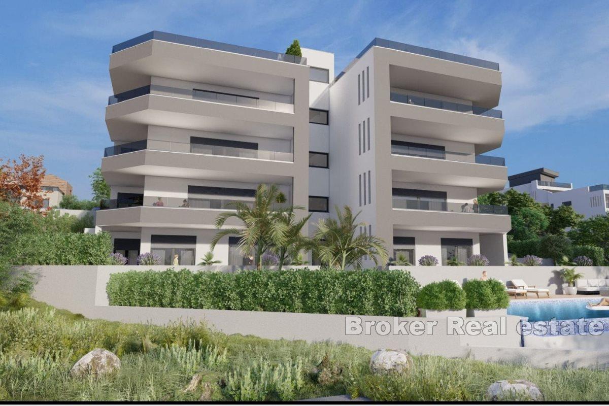Apartments under construction with swimming pool and open view