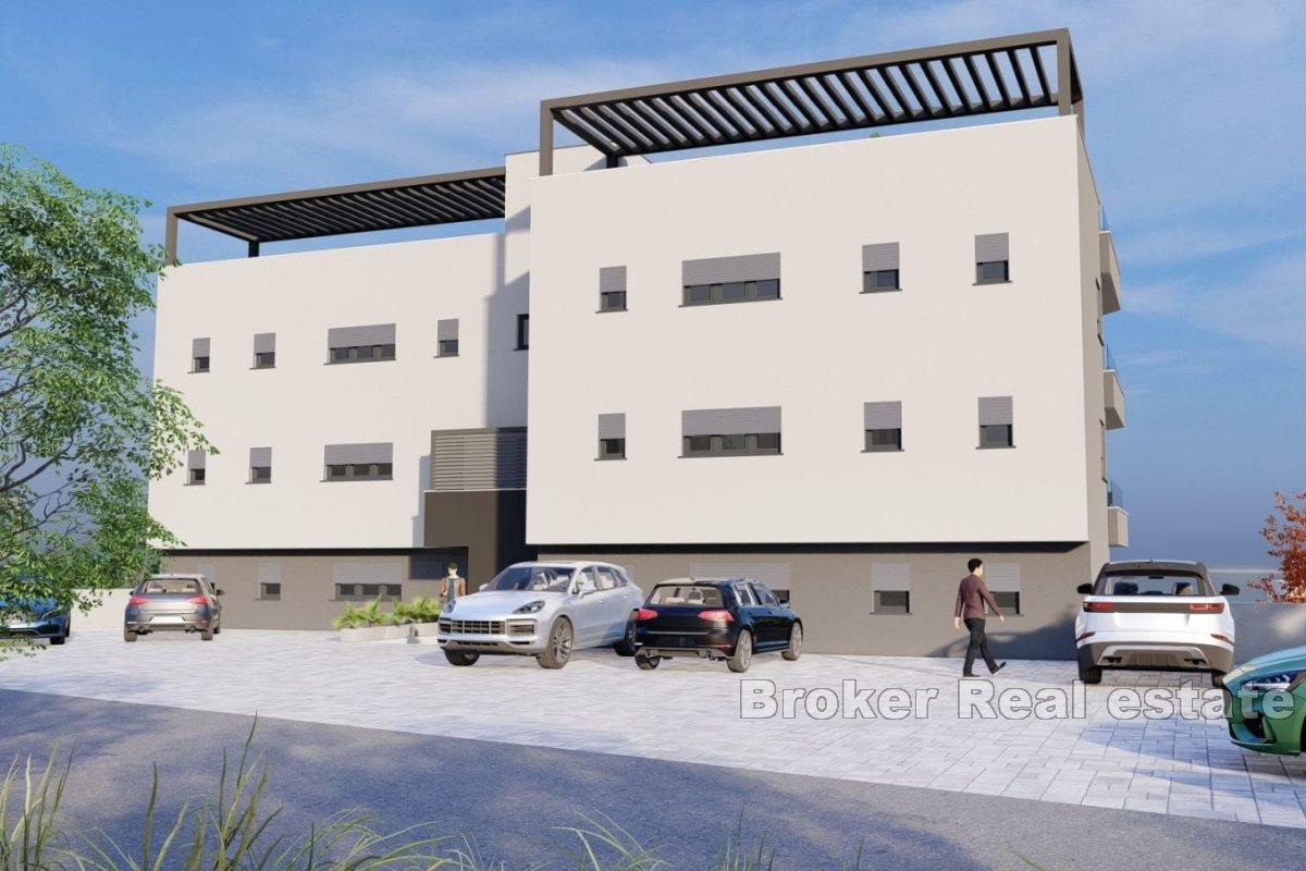 Apartments under construction with swimming pool and open view