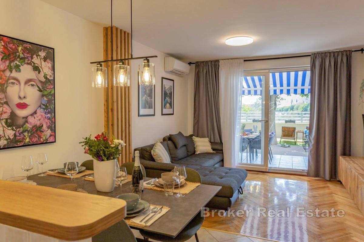 Appartamento confortevole con ampio giardino privato e grande potenziale