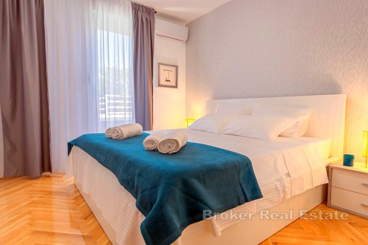 Appartamento confortevole con ampio giardino privato e grande potenziale
