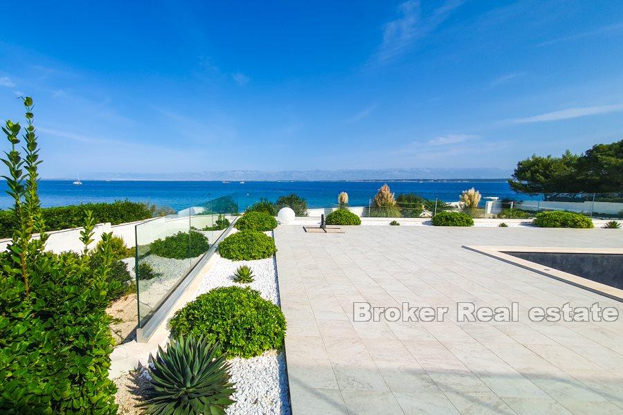 Exclusive villa on a spacious plot by the sea