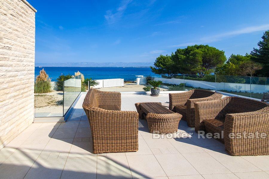 Exclusive villa on a spacious plot by the sea