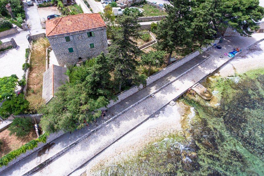 Charming old stone villa first row to the sea