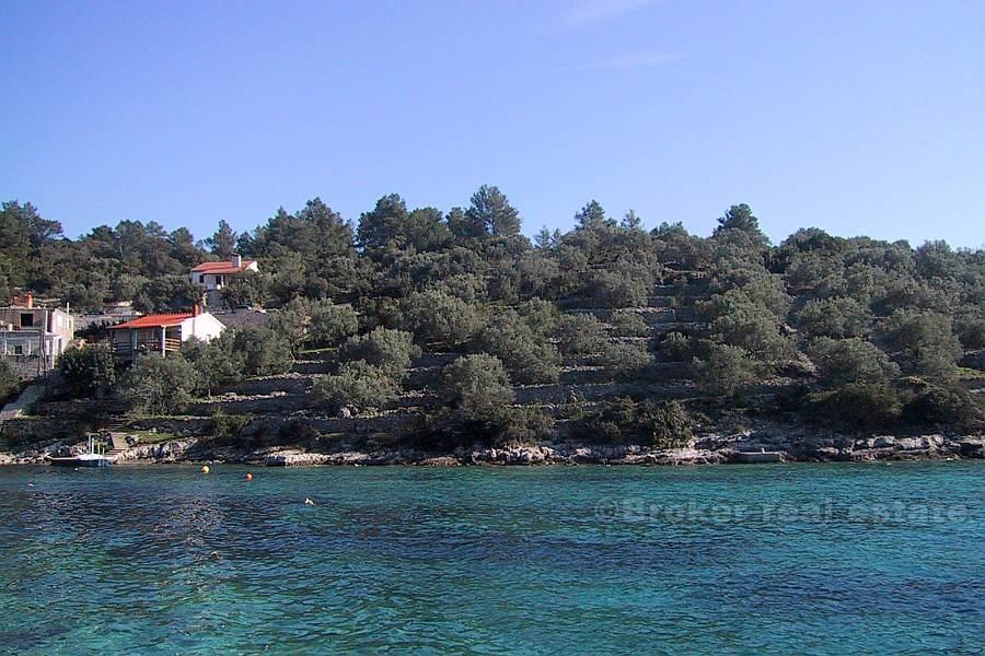 Terreno edificabile con posto barca per la barca, in vendita