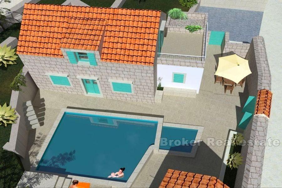Terrain constructible avec projet de reconstruction