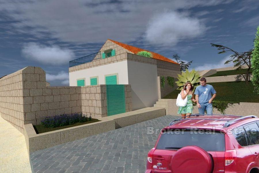 Terrain constructible avec projet de reconstruction