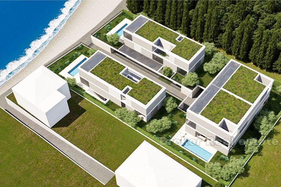 A vendre, terrain constructible, première rangée à la mer
