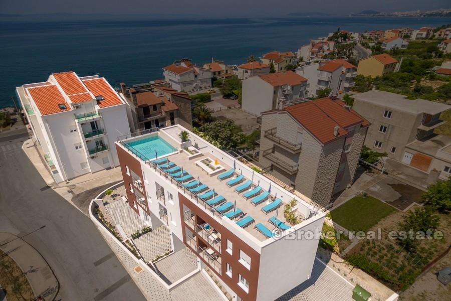 Appartamenti turistici in due edifici adiacenti, in vendita