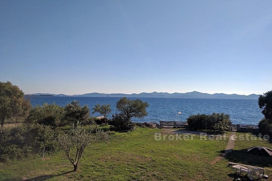 Maison / villa avec grand terrain, front de mer