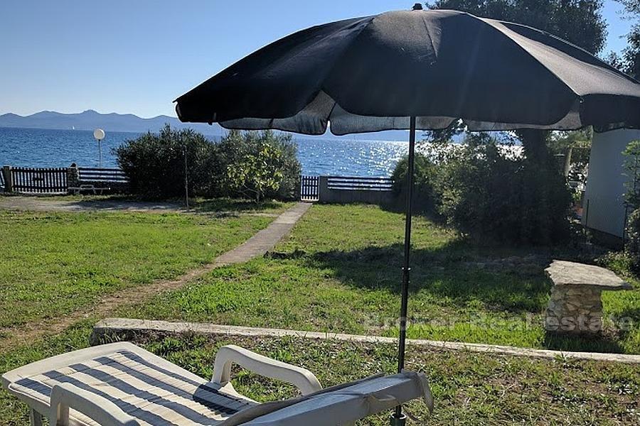 Maison / villa avec grand terrain, front de mer