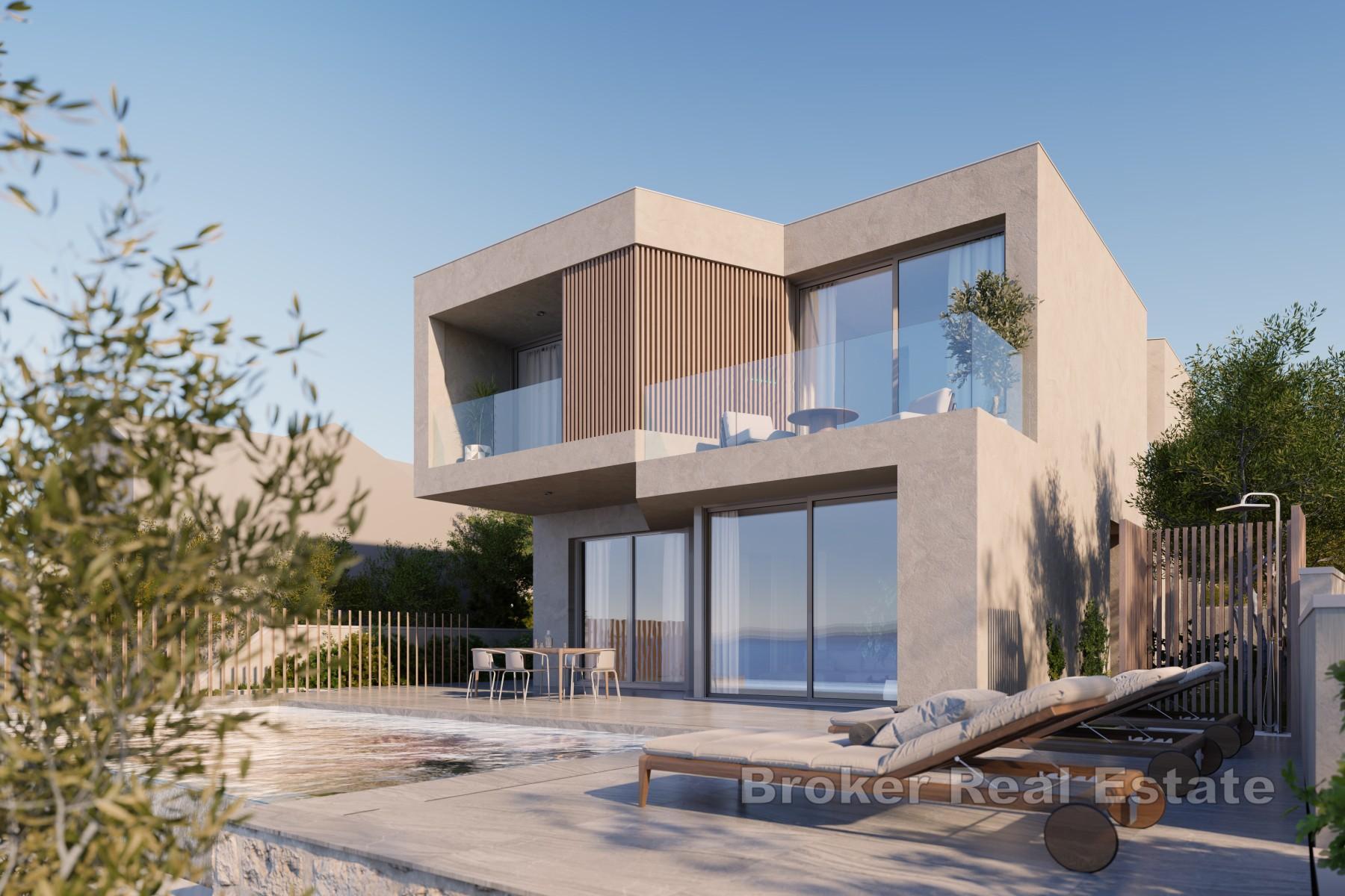 Villa moderne avec piscine située au premier rang de la mer