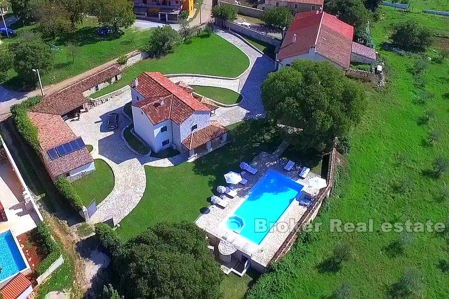 Houses with a pool on a large land plot