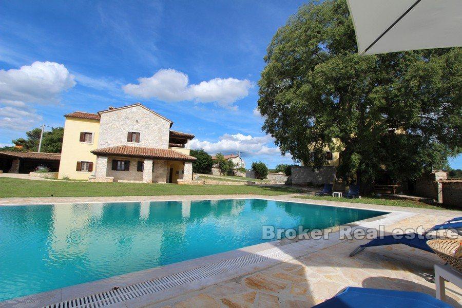 Houses with a pool on a large land plot