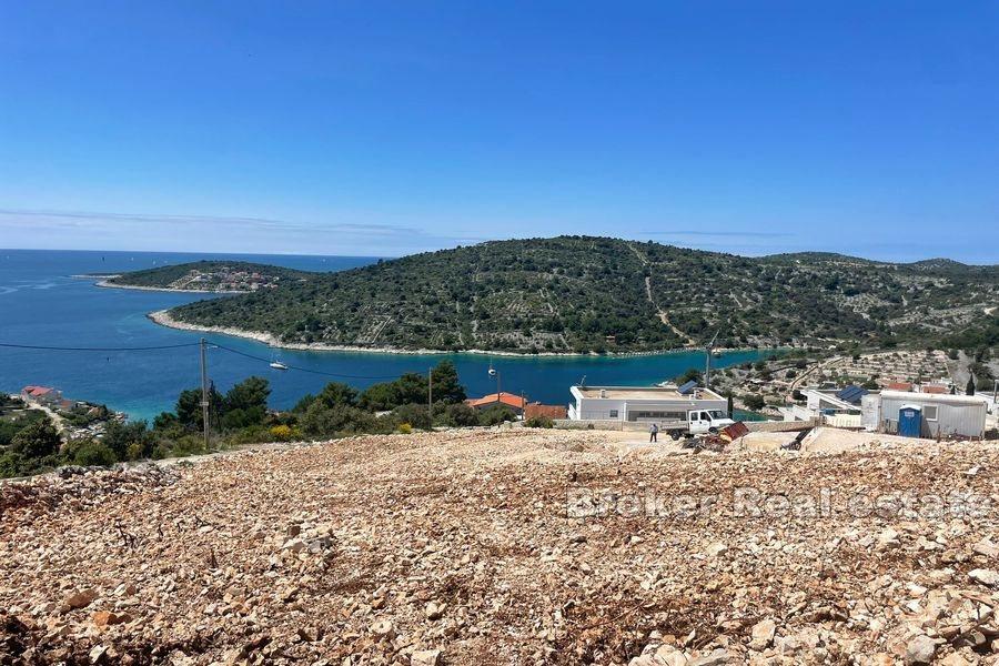 Land with an open sea view