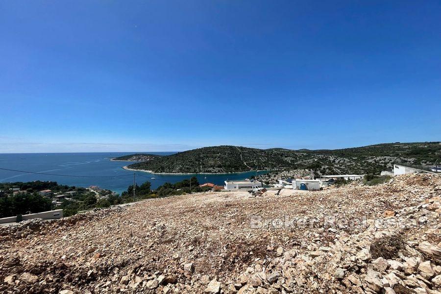 Land with an open sea view