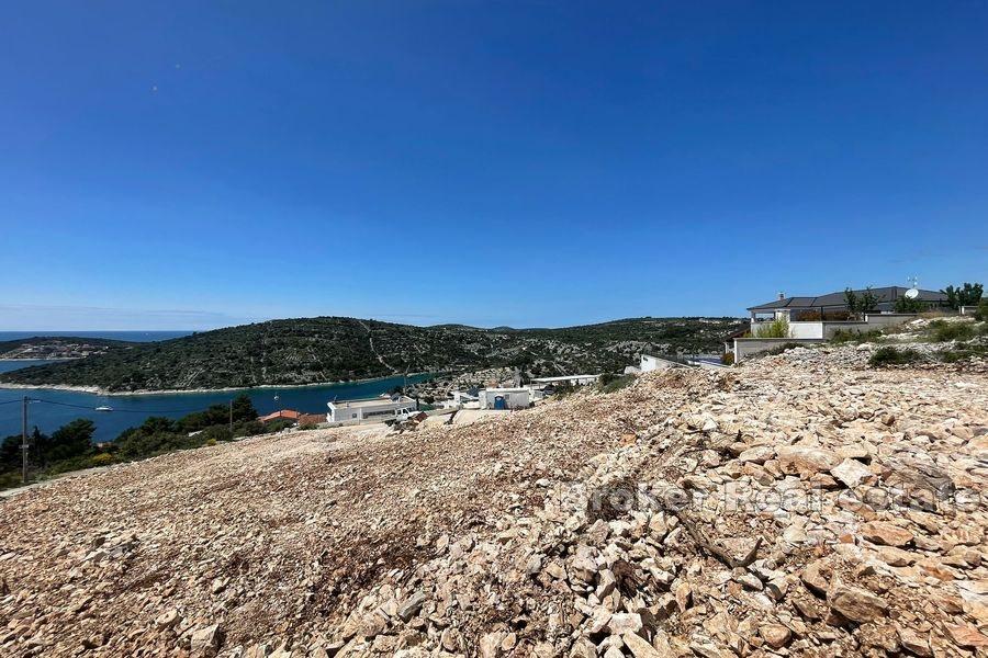 Land with an open sea view
