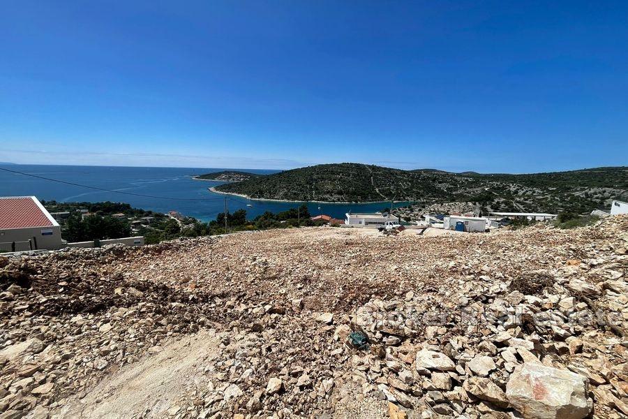 Land with an open sea view