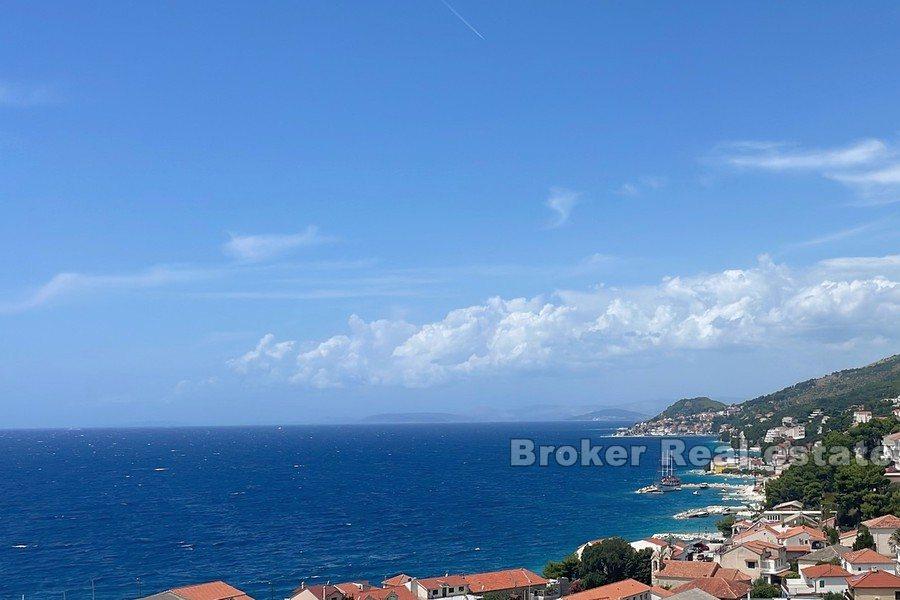 Land with an open sea view
