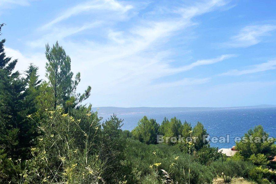 Land with an open sea view