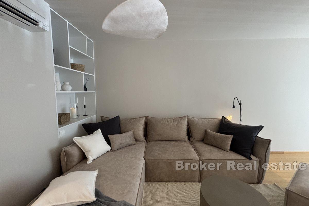 Three bedroom apartment in a new building with parking