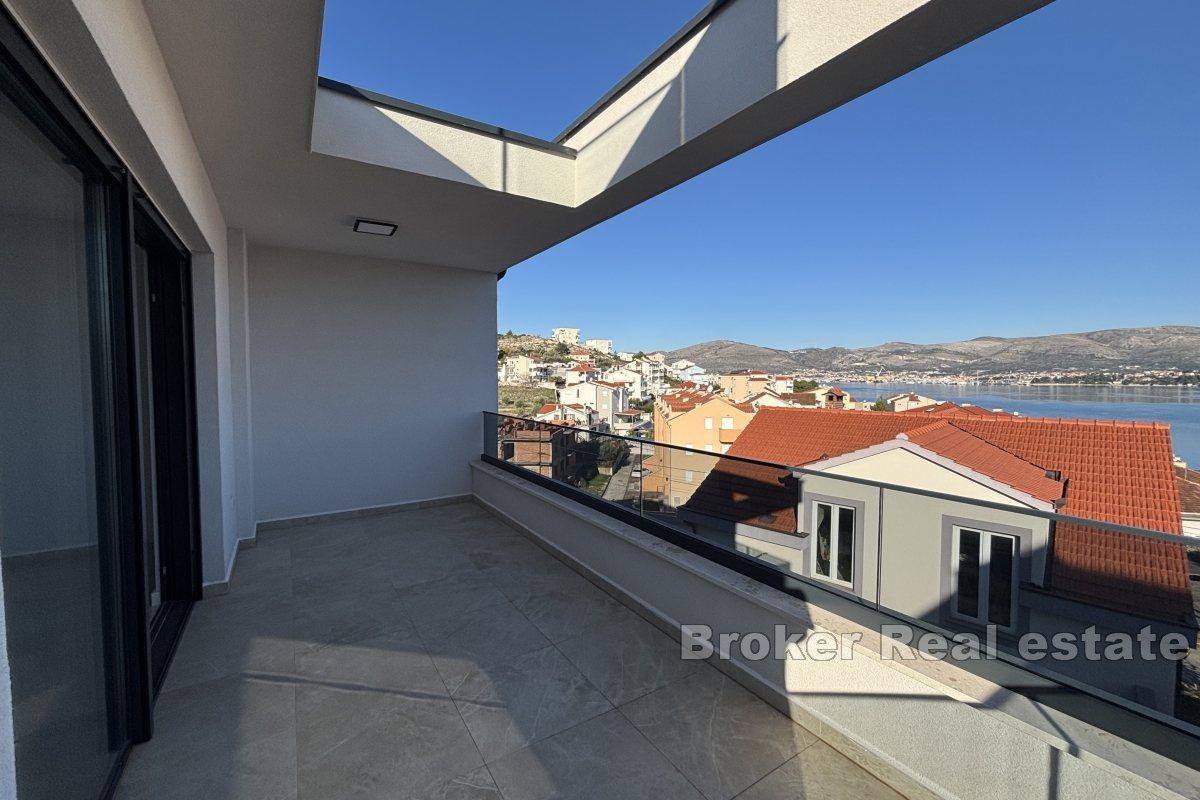 Luxueux penthouse de trois chambres avec terrasse sur le toit