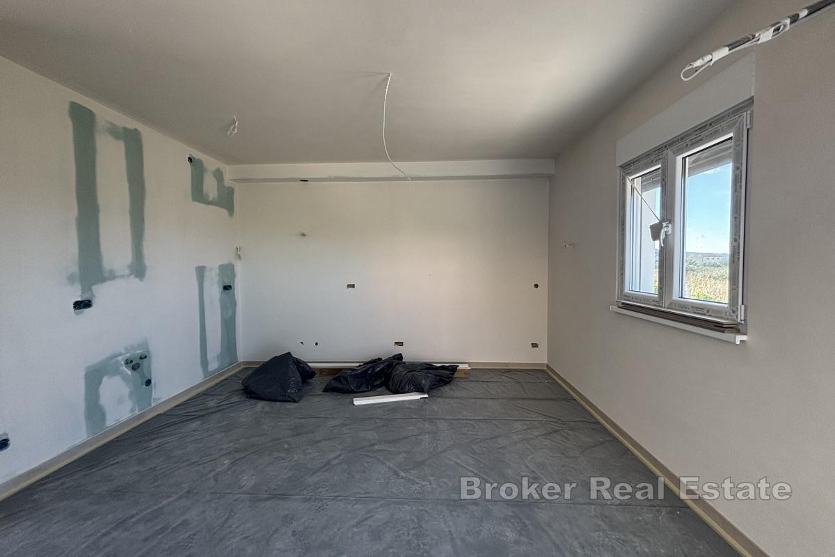 Appartement neuf avec jardin