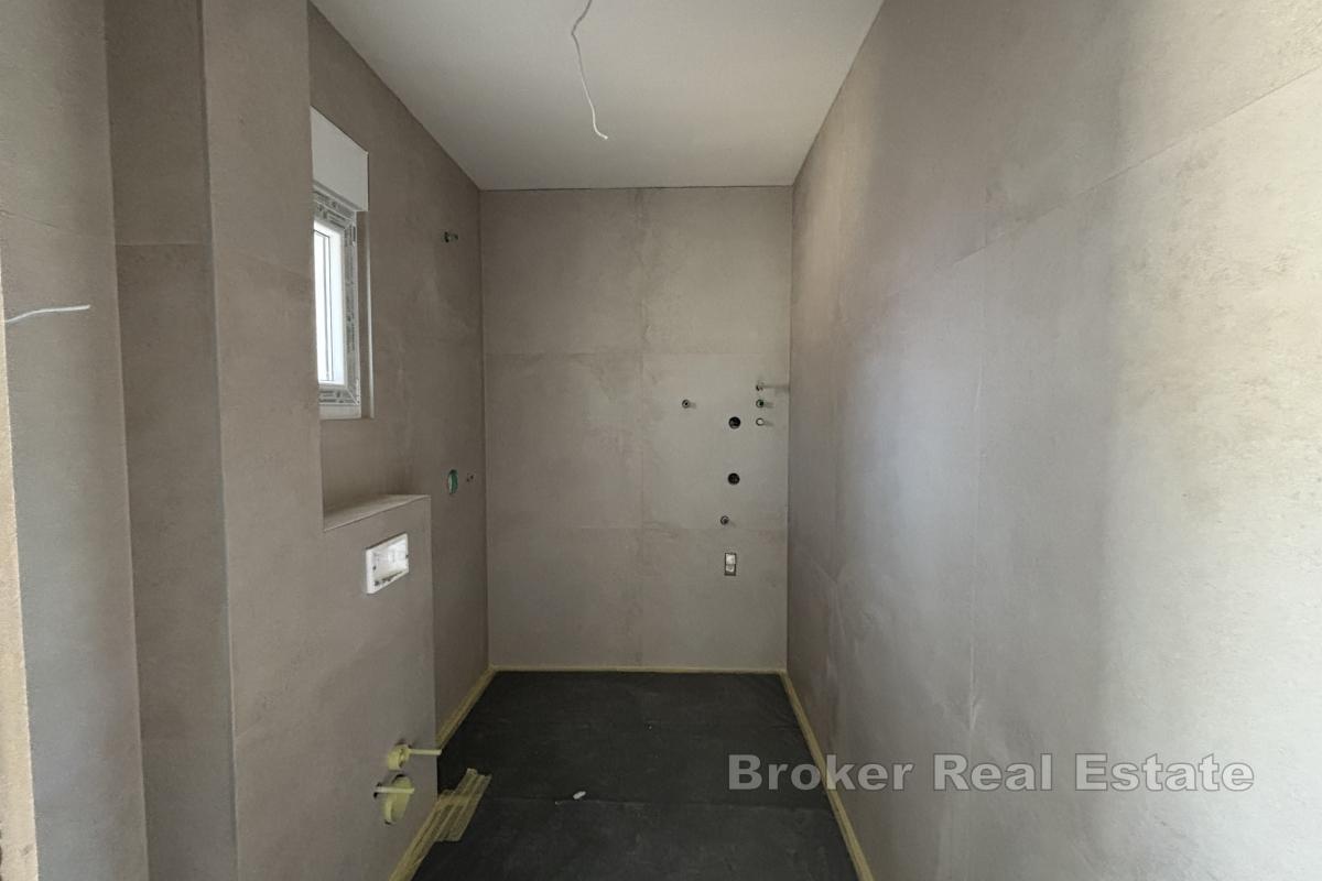 Appartement neuf avec jardin
