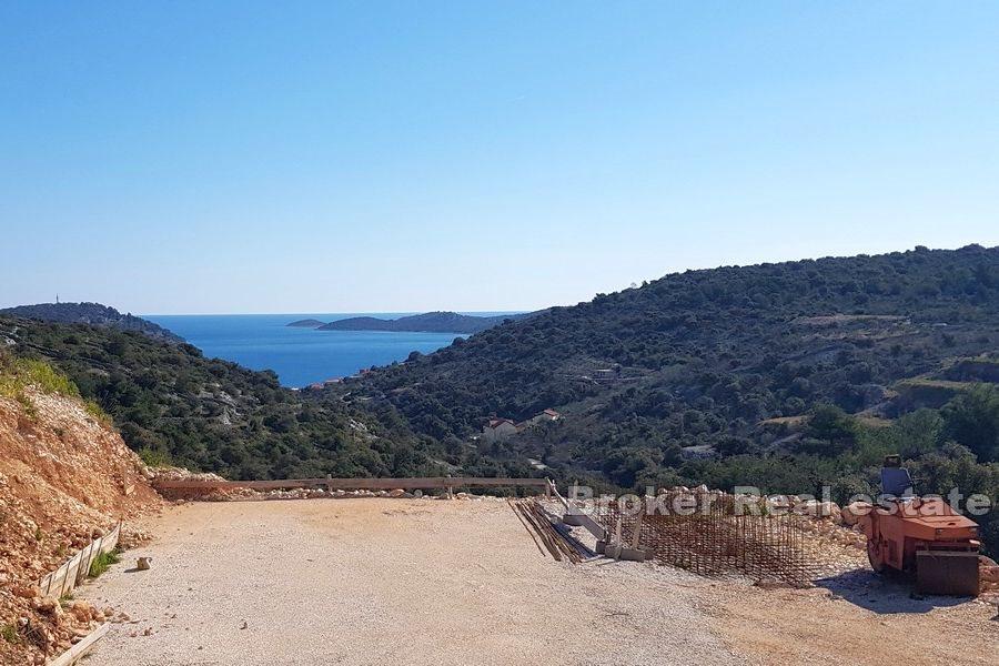 Villa under construction with a panoramic view