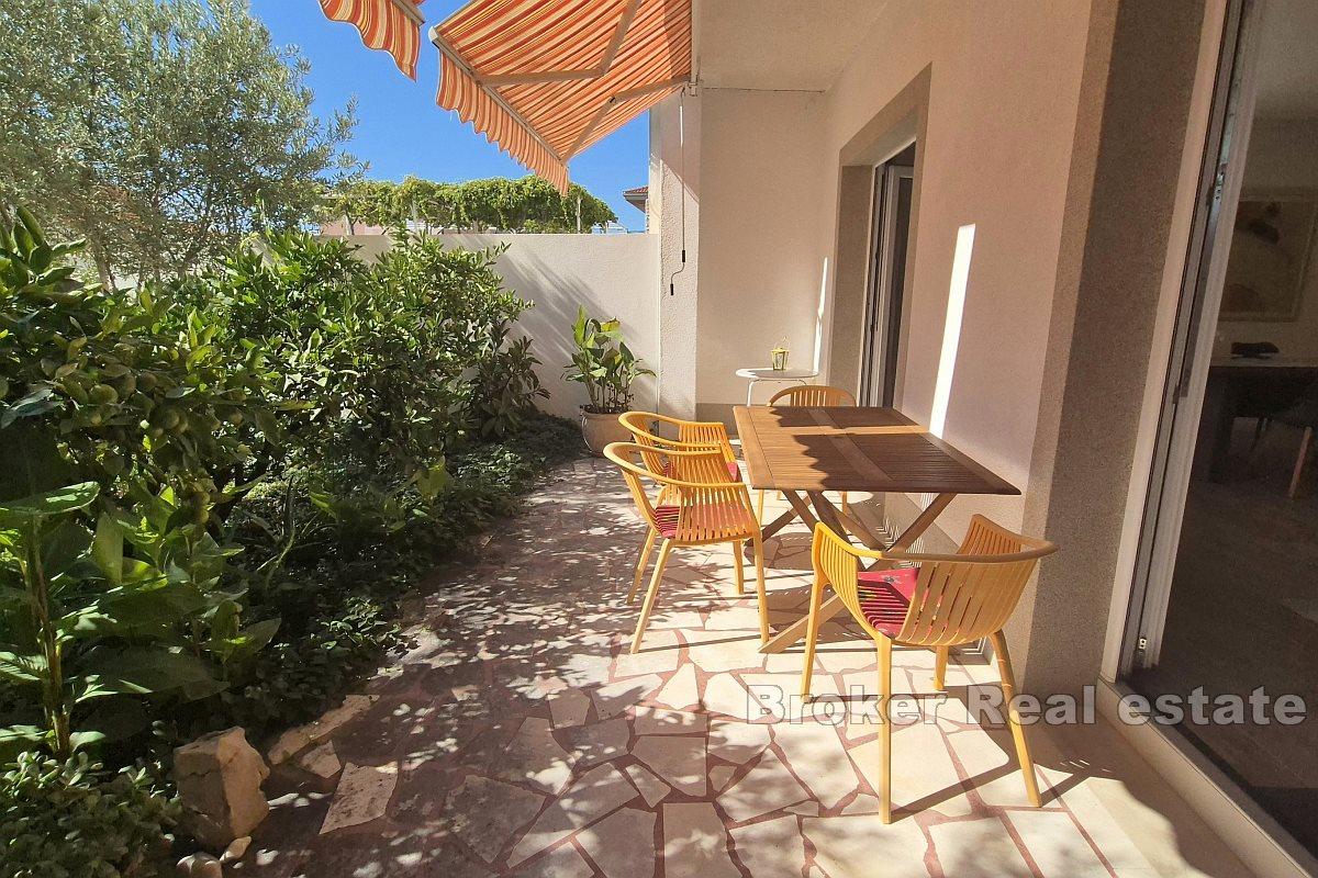 Spazioso appartamento con giardino e garage