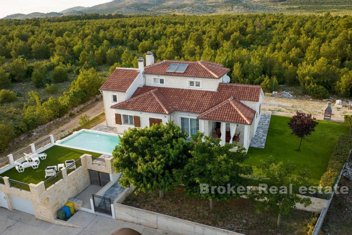 Villa with a pool and large yard