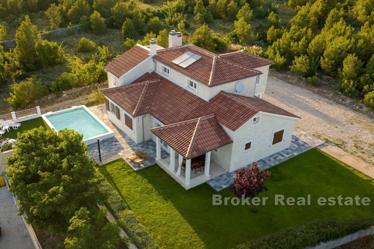 Villa with a pool and large yard
