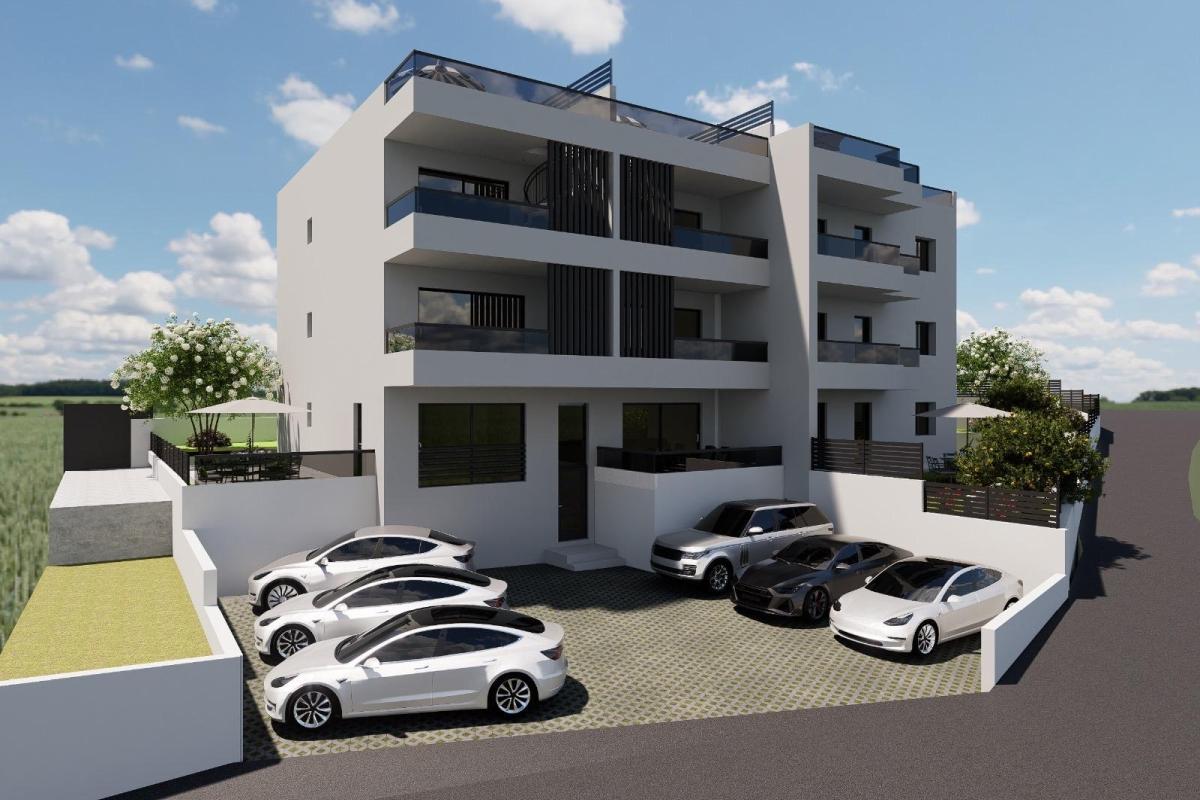 Appartamento in un nuovo edificio con giardino e posto auto