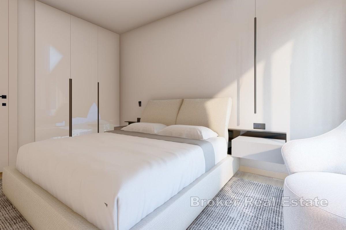 Bellissimo appartamento con tre camere da letto in un edificio di nuova costruzione con vista mare