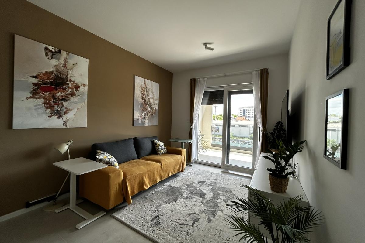 Monolocale elegantemente arredato con garage e terrazza - prima locazione