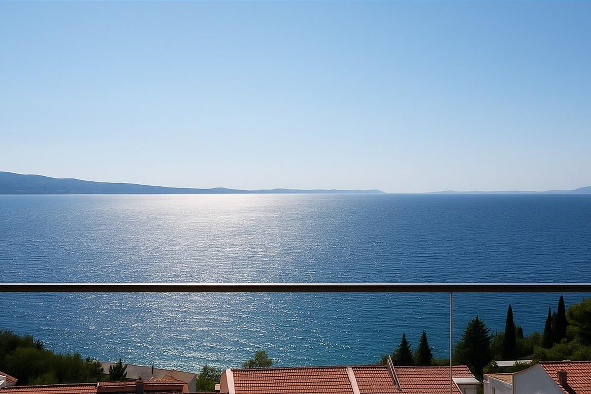 Moderne Ein-Zimmer-Wohnung im Erdgeschoss eines Neubaus mit Meerblick