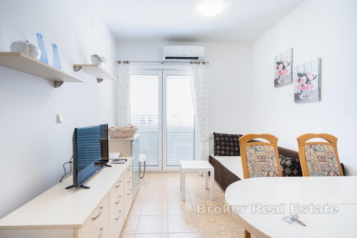 Appartamento con due camere da letto, terrazza e parcheggio