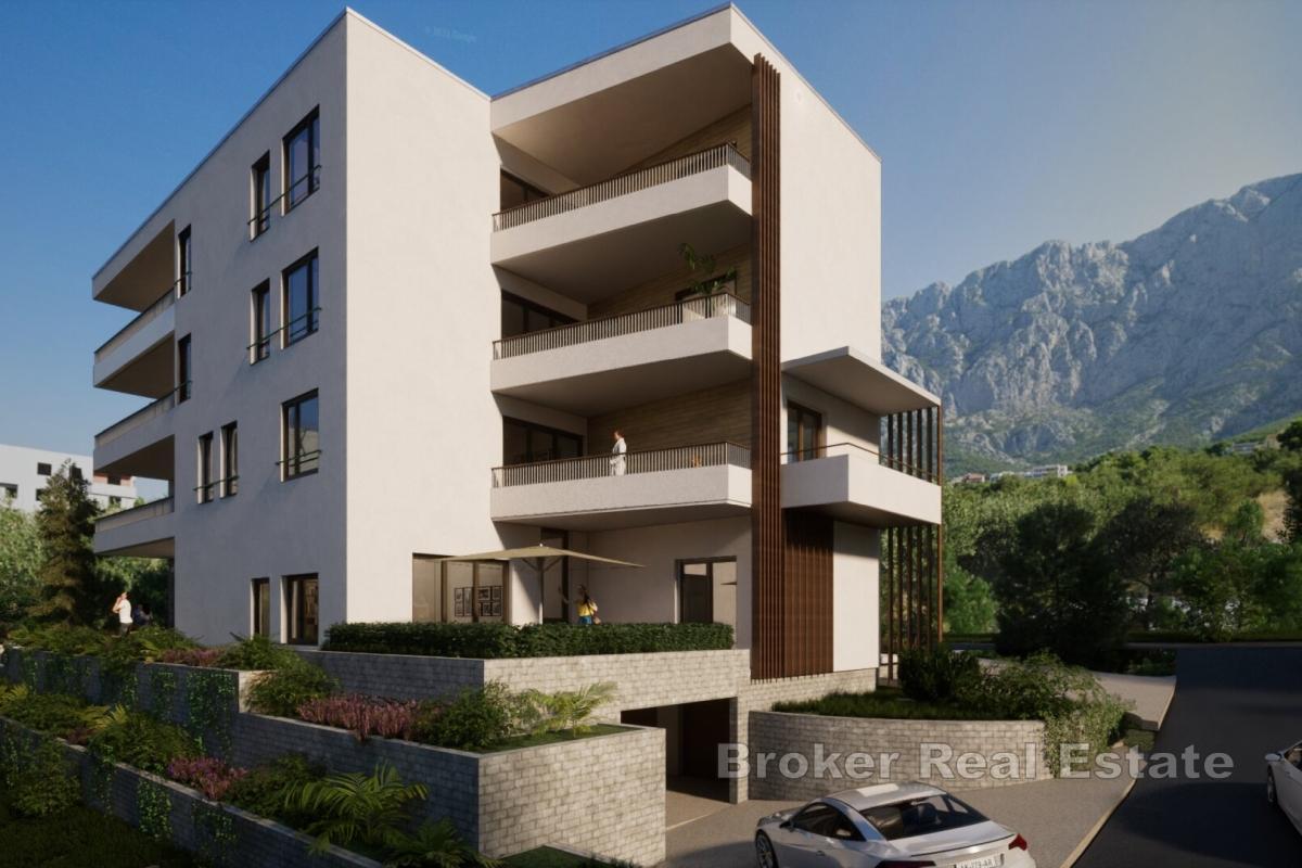 Appartamento con tre camere da letto, balcone e vista mare in un edificio di nuova costruzione